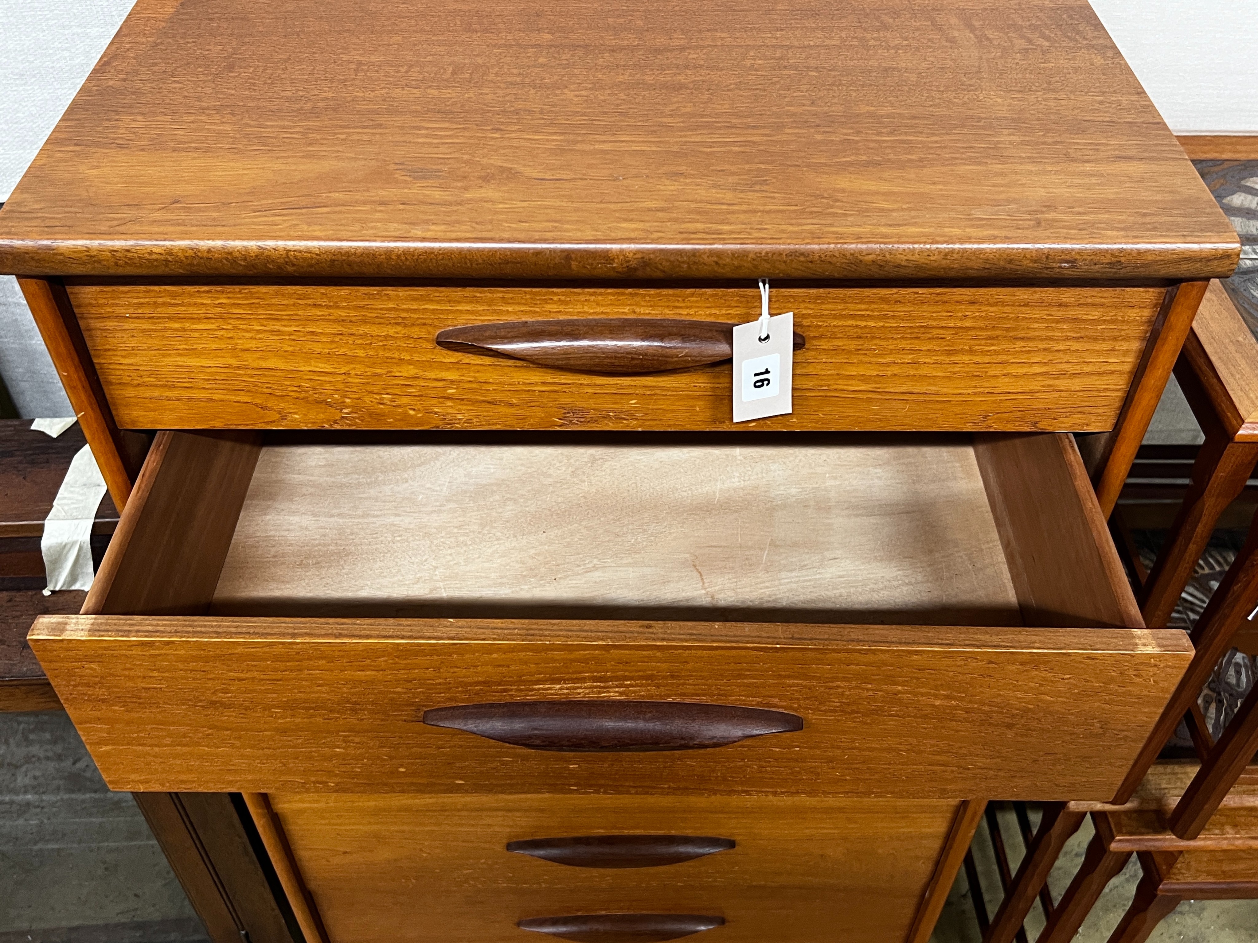 A mid century Austinsuite teak six drawer chest, width 64cm, depth 43cm, height 116cm